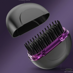 Hair dryer with a purple comb attachment on a purple background